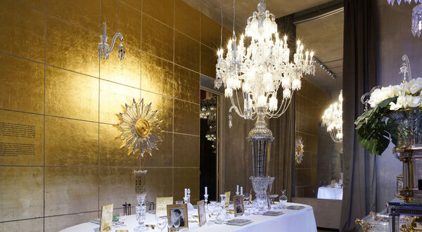 Baccarat extends partial layoffs