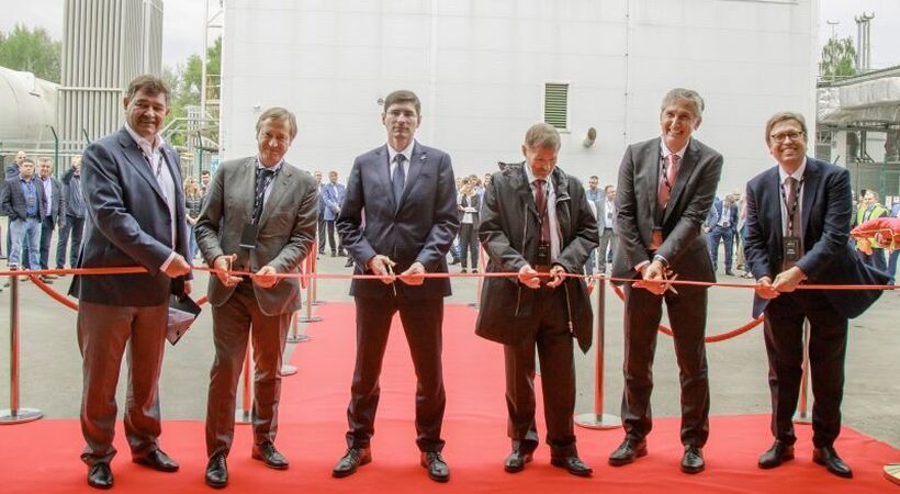 Andrey Sanosyan, Vice-Governor of the Nizhny Novgorod region and Marc Michielsen, the Ambassador of Belgium in Russia (both middle) were part of the ribbon cutting to celebrate the production line's completed renovation.
