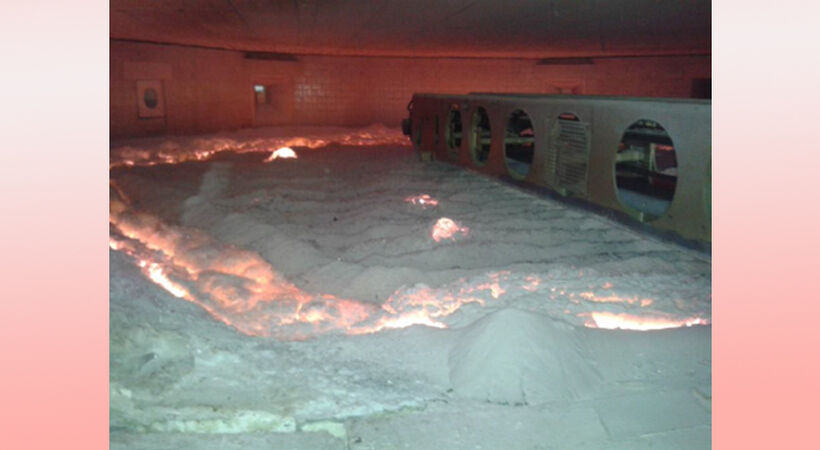 Cold batch on top of melt in full electric furnace.