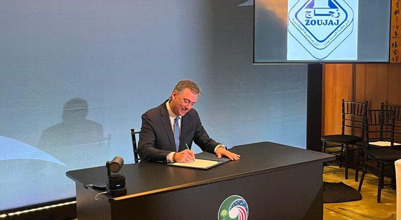Ron Vaupel, President and CEO of Guardian Industries, signing the Memorandum of Understanding during the US–Saudi Business Forum in Washington, D.C.
